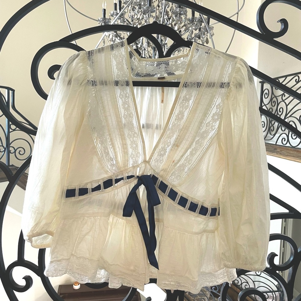 Peplum lace and ribbon top